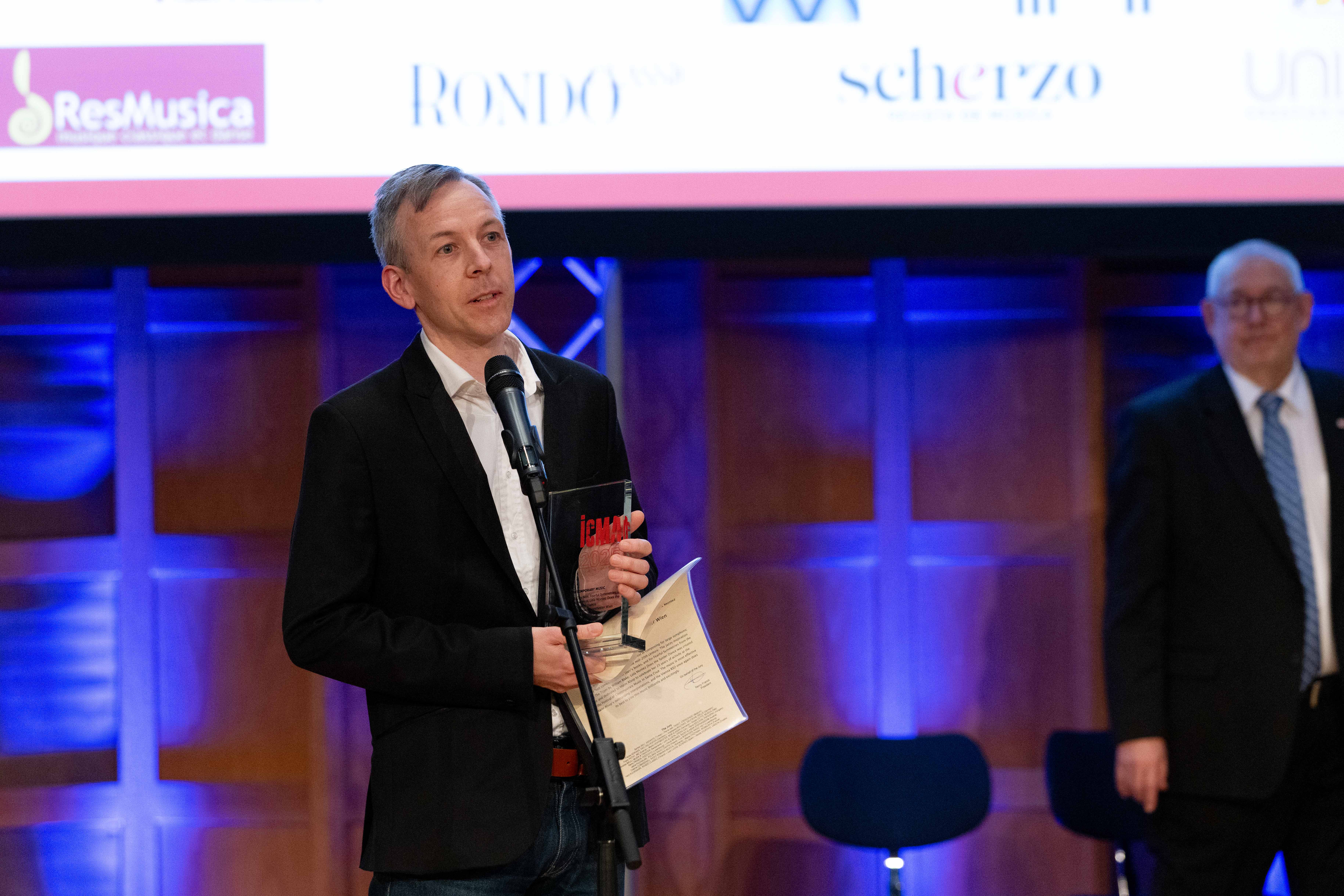 Iwen Schmees, CEO of Naxos Deutschland and Global COO of Naxos Music Group, accepts the Contemporary Music Award on behalf of Marin Alsop